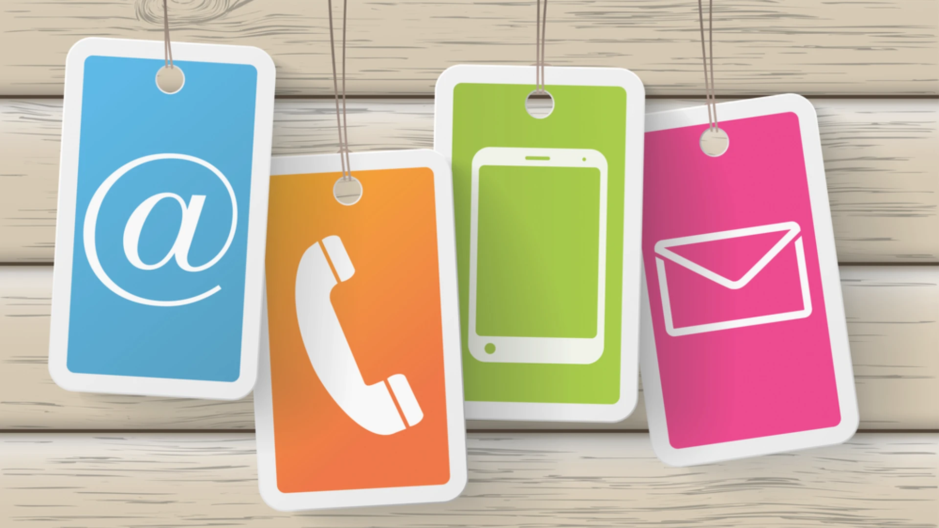 Colorful contact icons including email symbol, phone handset, smartphone, and envelope on hanging tags for a contact us page