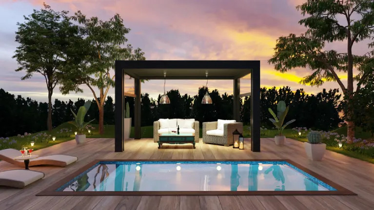 Stylish deck design with cozy lounge seating and modern pool at sunset—showcasing a custom outdoor space that reflects personal style.