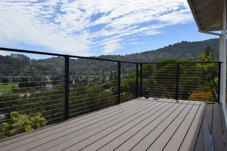Trex composite deck with sleek cable railing overlooking Moreno Valley—showcasing high-quality decking materials built to last in Southern California.
