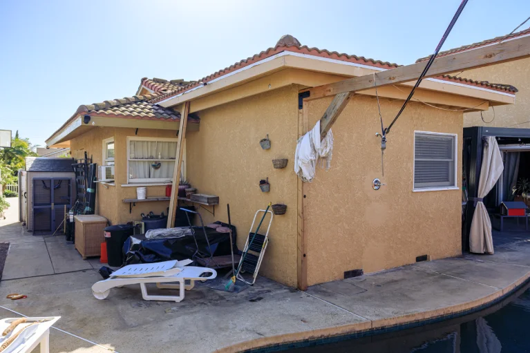 uneven stucco texture and surface deterioration on exterior wall in Garden Grove California before renovation