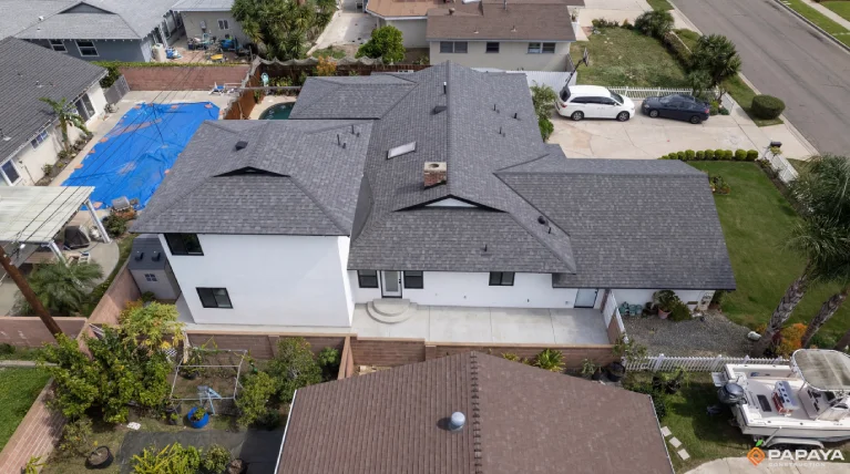 combination of new roof and white stucco exterior on renovated home in Garden Grove CA