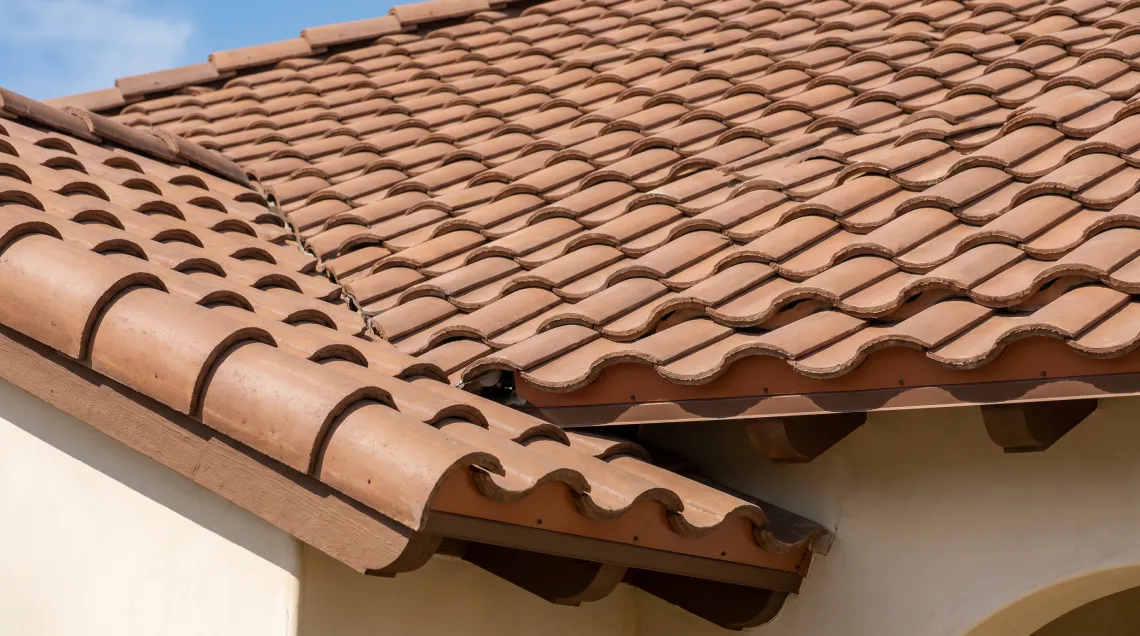 Concrete tile Class A roof installation on a Mediterranean-style home in Irvine, Orange County