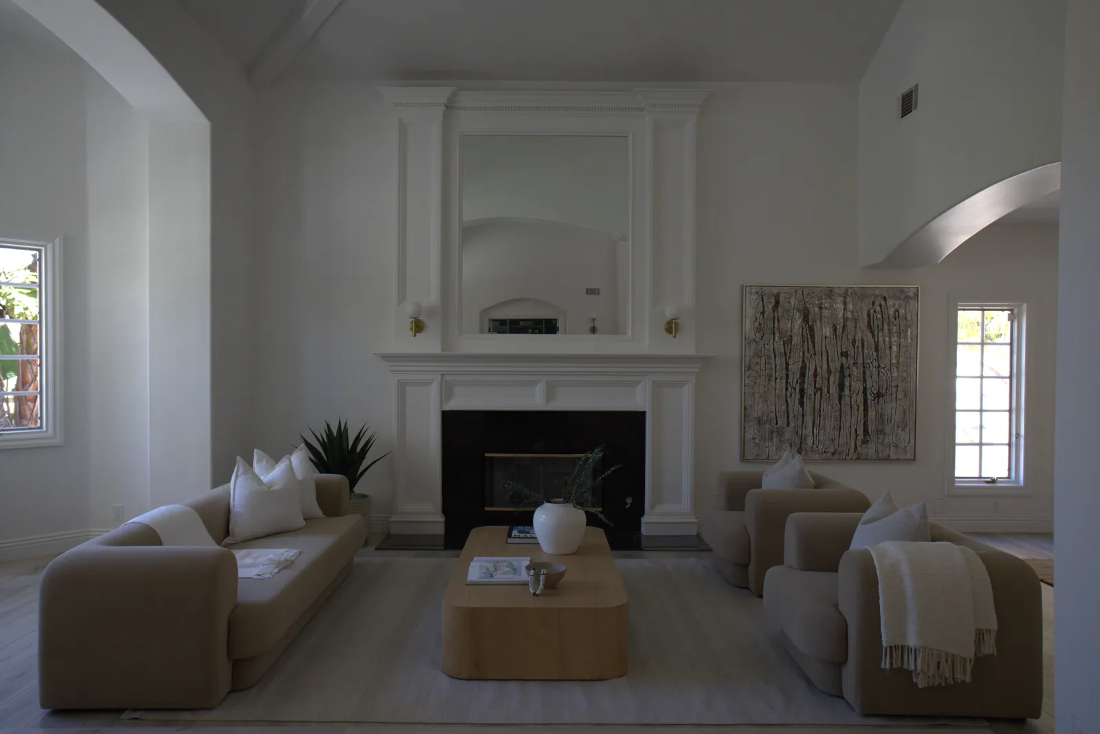 Freshly painted formal living room with custom fireplace mantle, Laguna Hills remodel