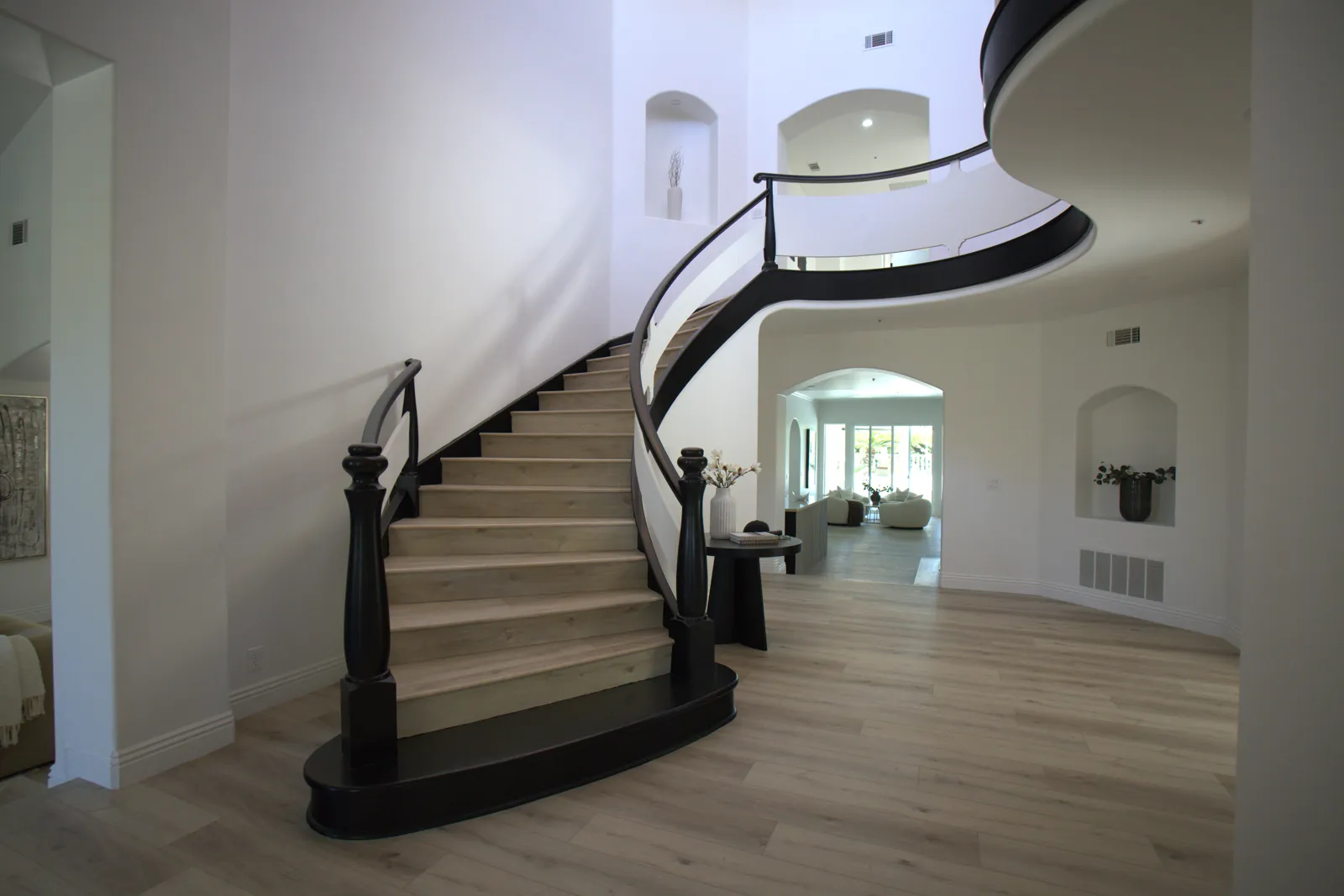 Remodelled staircase and living room in a Laguna Hills, CA home